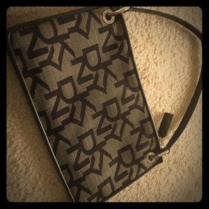 Beautiful DKNY canvas clutch perfect condition